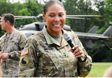 Cadet with microphone smiling
