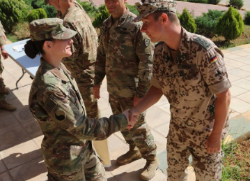 Two cadets shaking hands