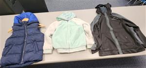 blue vest, white and mint sweatshirt, black sweatshirt